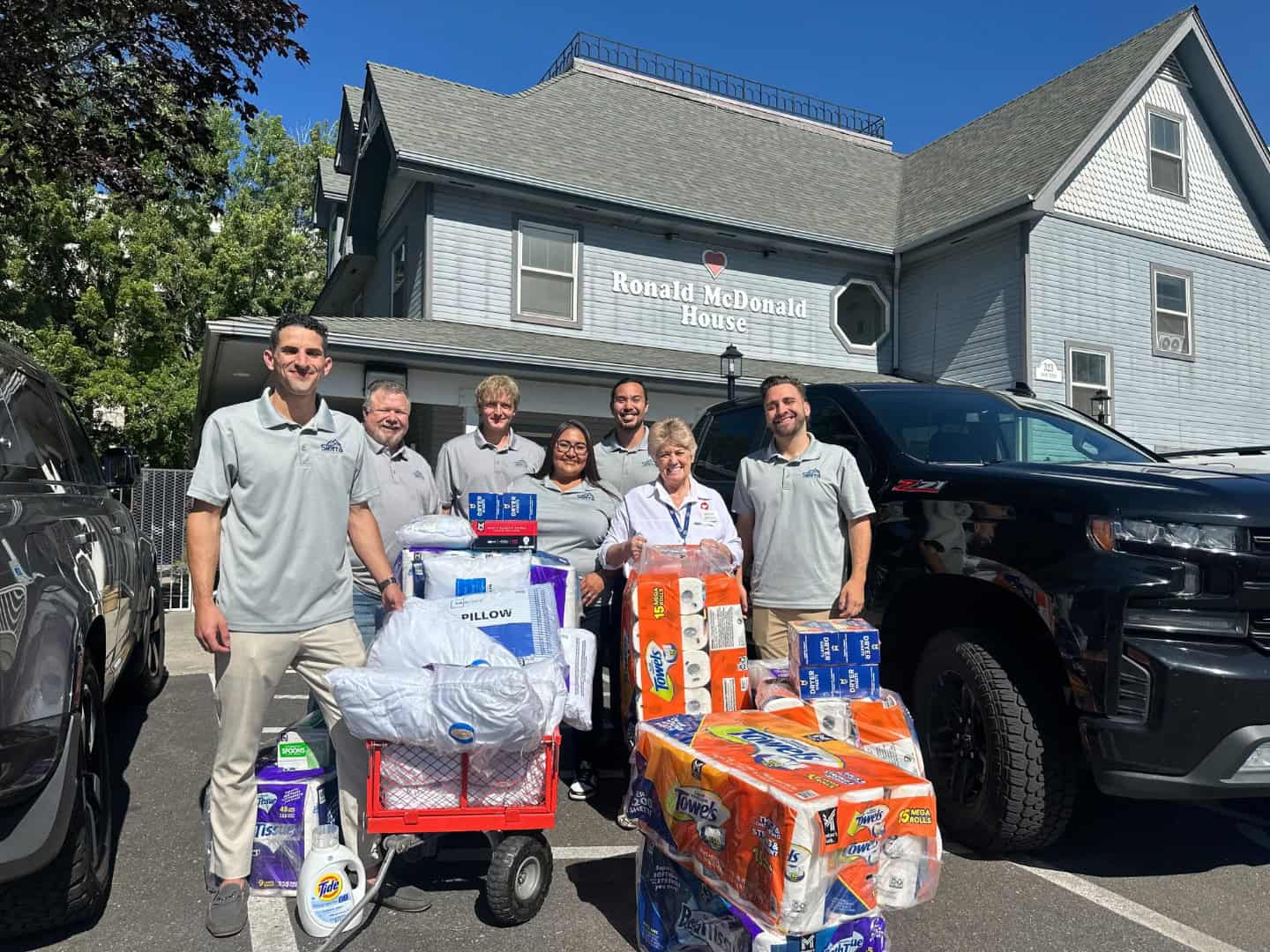 The Sierra Homebuyers team delivering donated supplies to the Ronald McDonald House in Reno